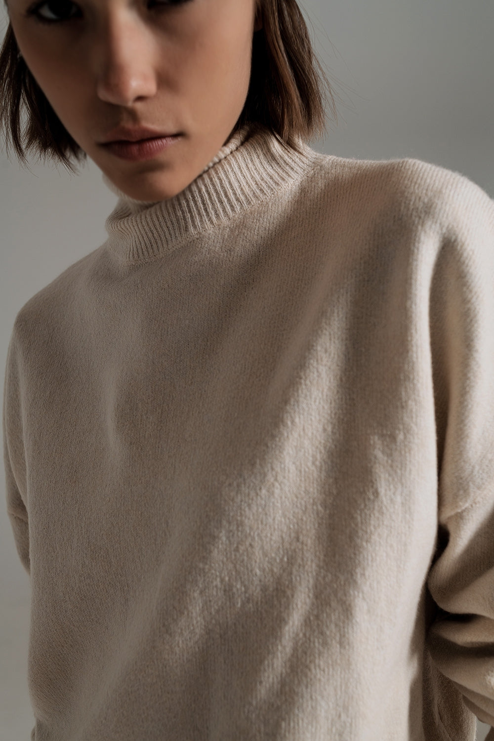 Beige turtleneck sweater in a soft knitted fabric - Szua Store