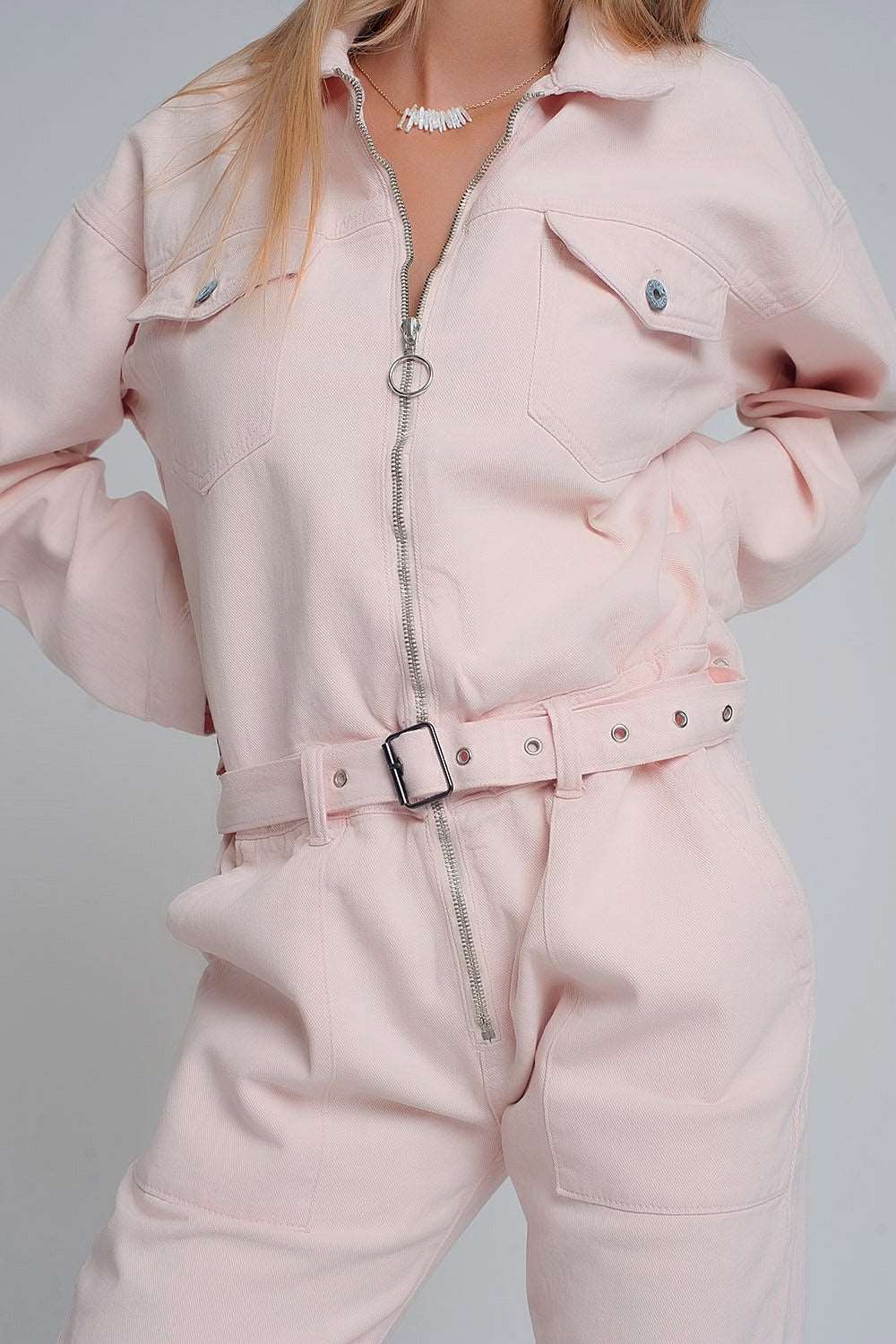 Belted denim boilersuit in pink Szua Store