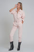 Belted denim boilersuit in pink Szua Store