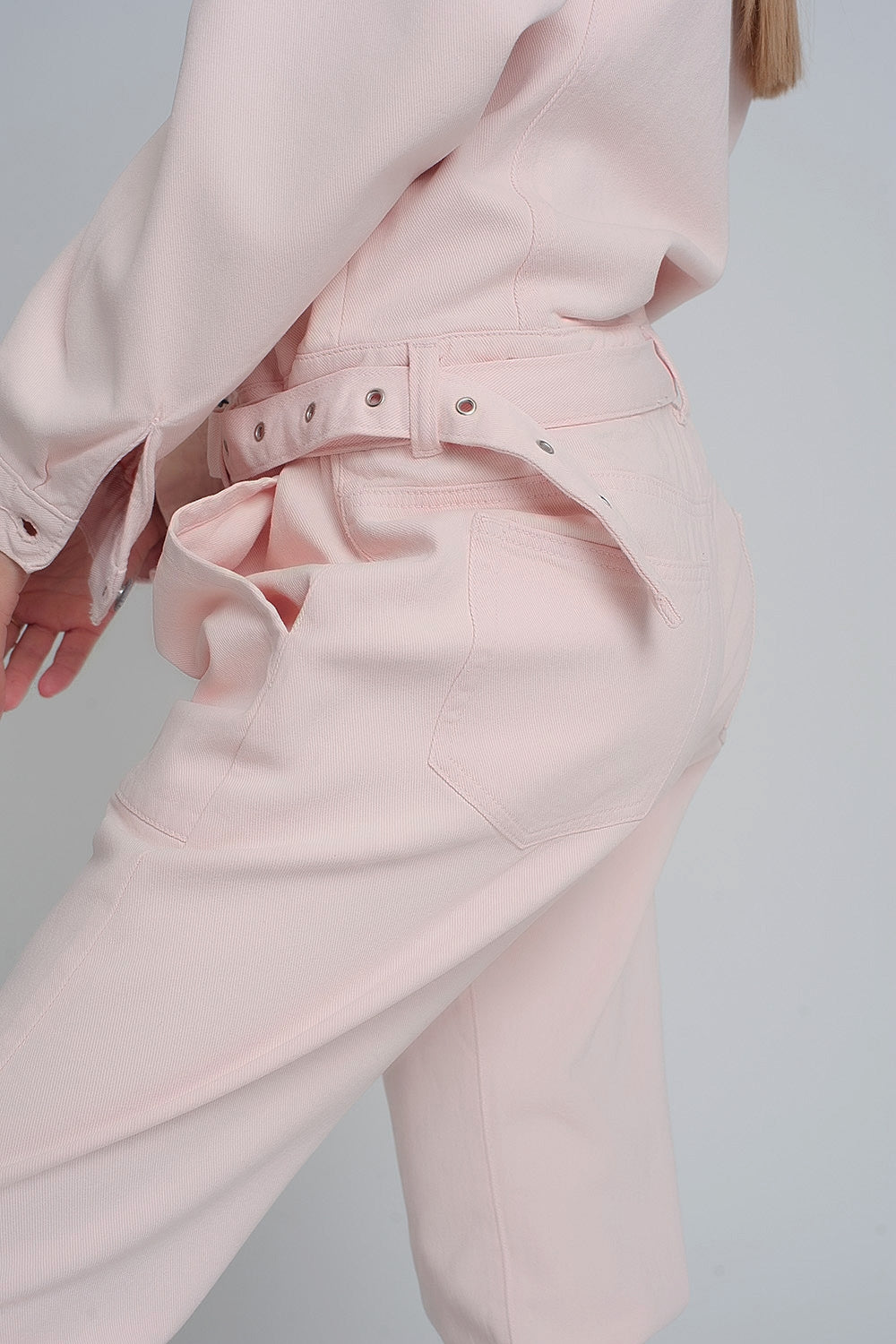 Belted denim boilersuit in pink Szua Store