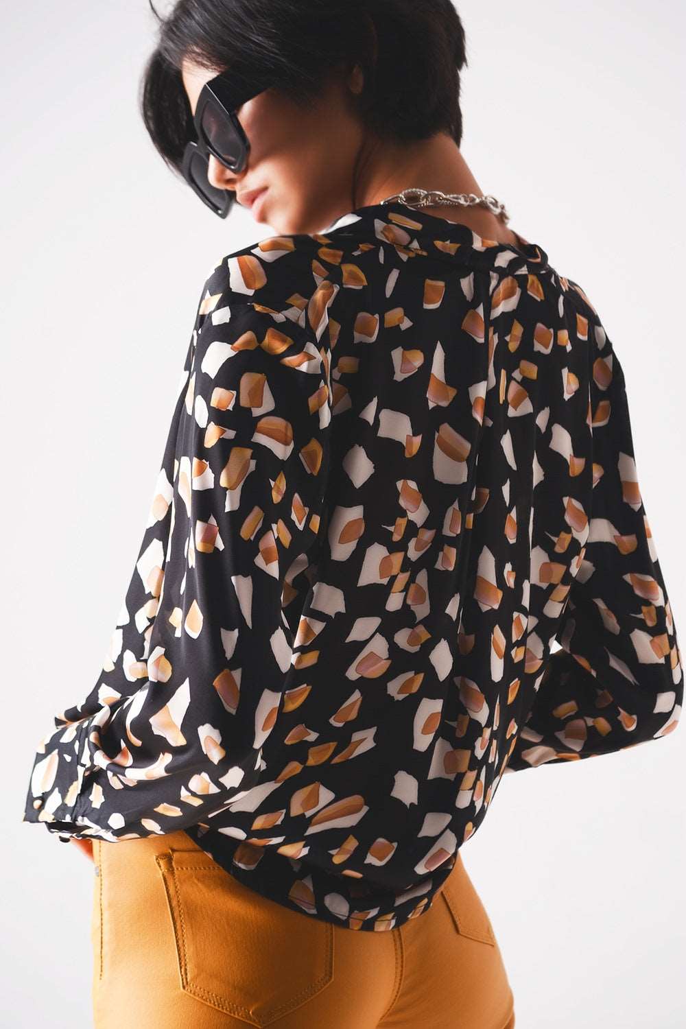 Black blouse with print and wrapped front Szua Store