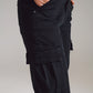 Pantalón cargo negro con cintura y bajo elásticos