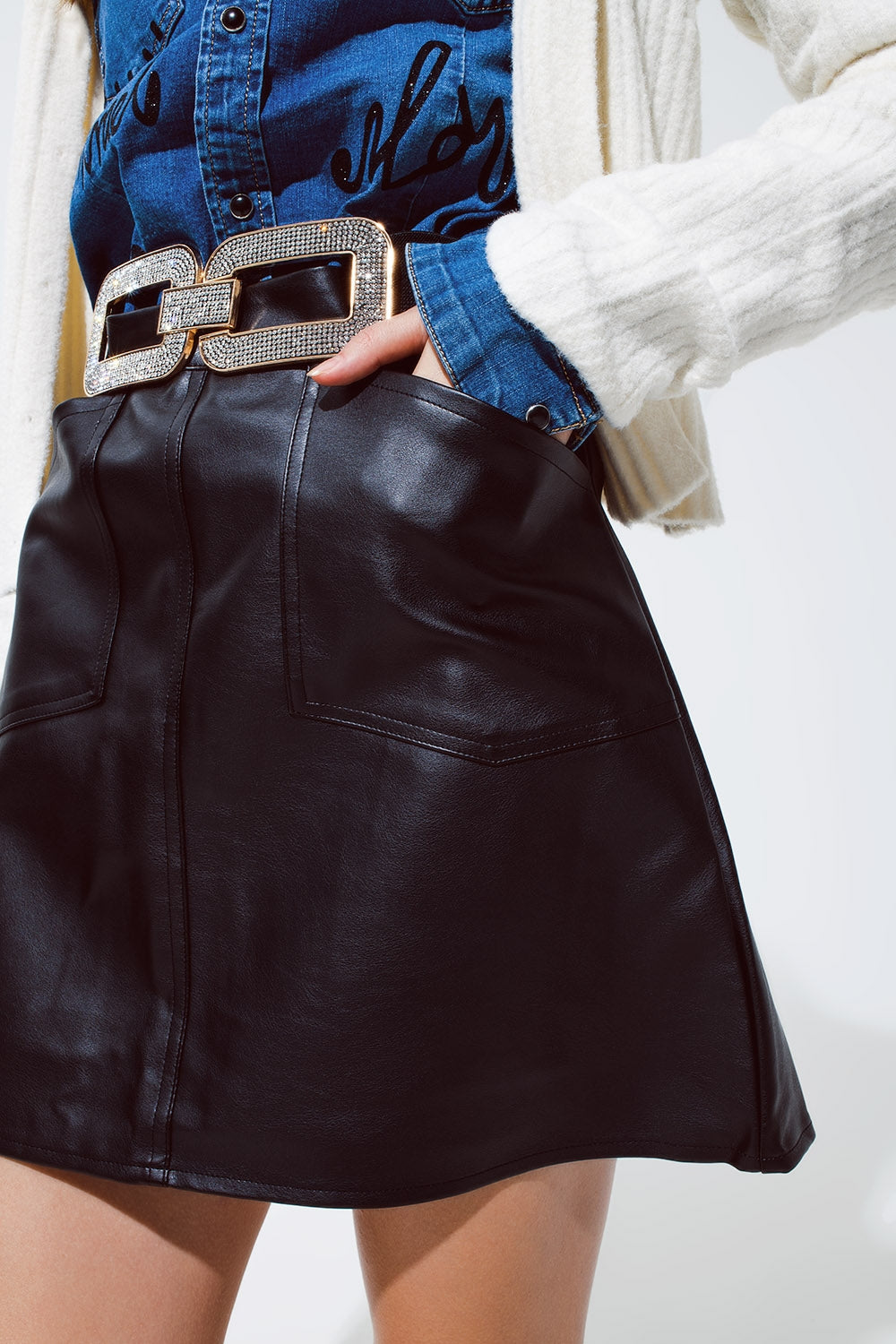 Black Leatherette mini skirt with pockets