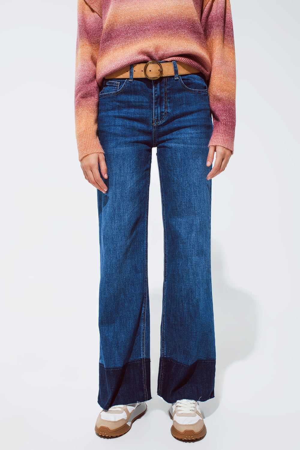 Blue flaired jeans with dark blue hem