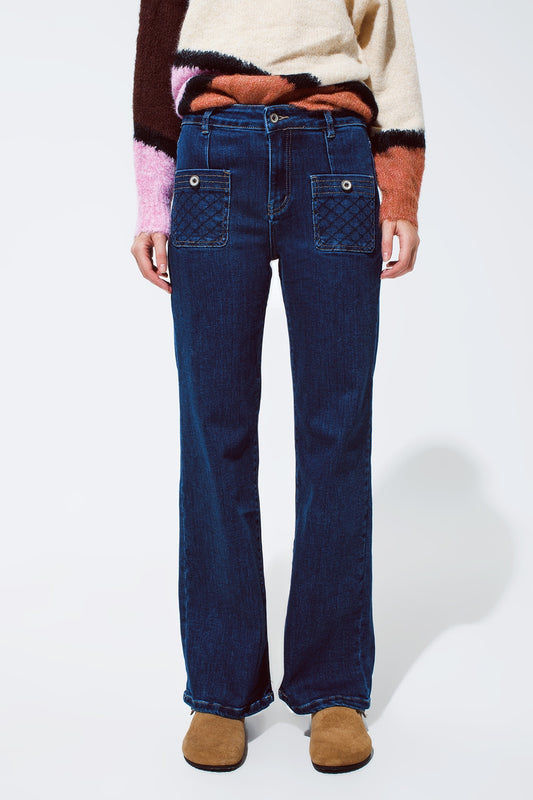 Q2 Blue jeans with buttoned pocket details in dark wash