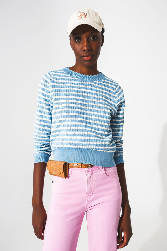 Q2 Blue striped sweater with ruffled trim