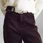 Pantalón relajado marrón con detalle de bolsillo en la cintura