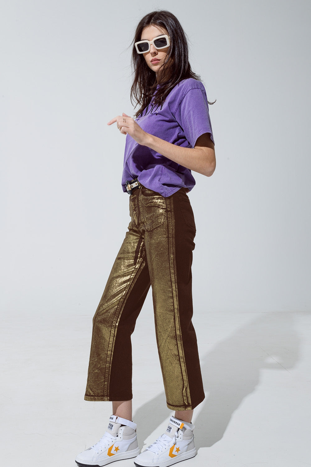 Brown straight leg jeans with gold metallic glow