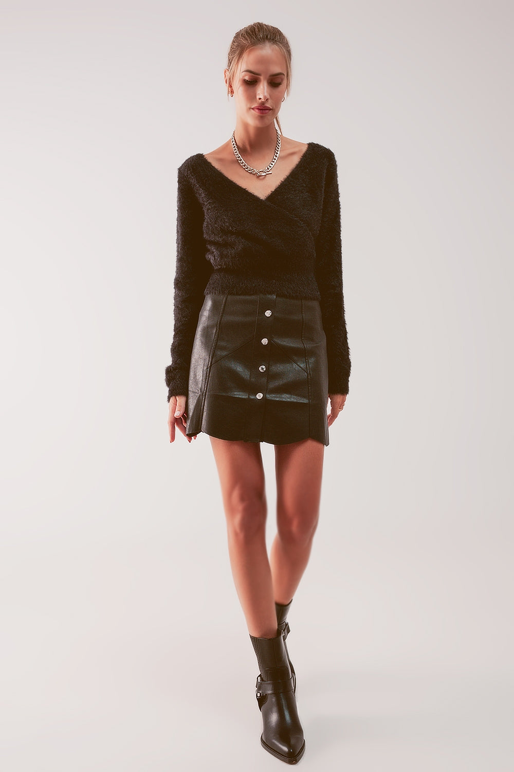 Button through mini skirt in black Szua Store