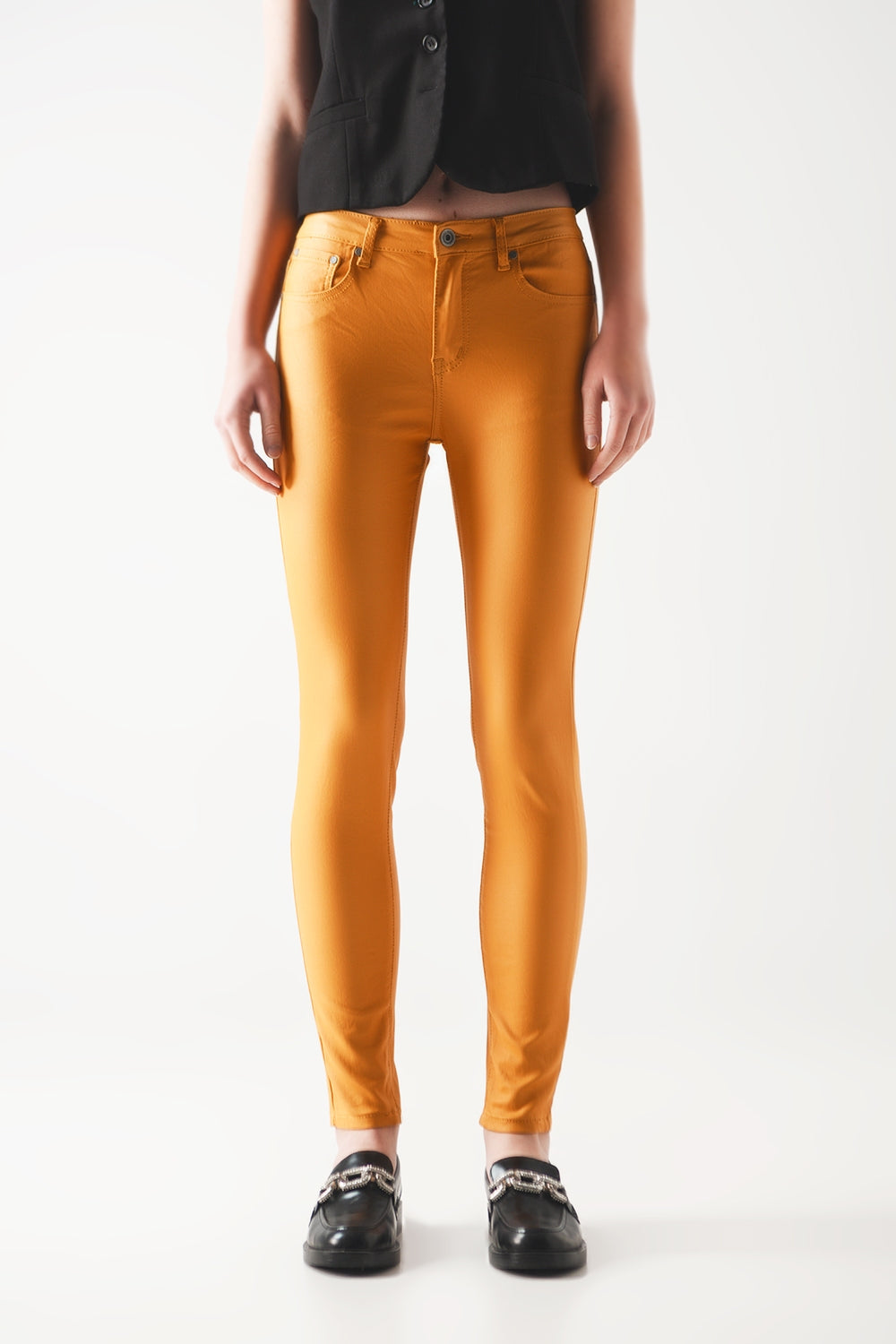 Coated pants in orange Szua Store