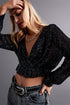 Cross over cropped and sheer top with sequins in black Szua Store