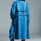 Demin trench coat with belt and raw edges in mid wash