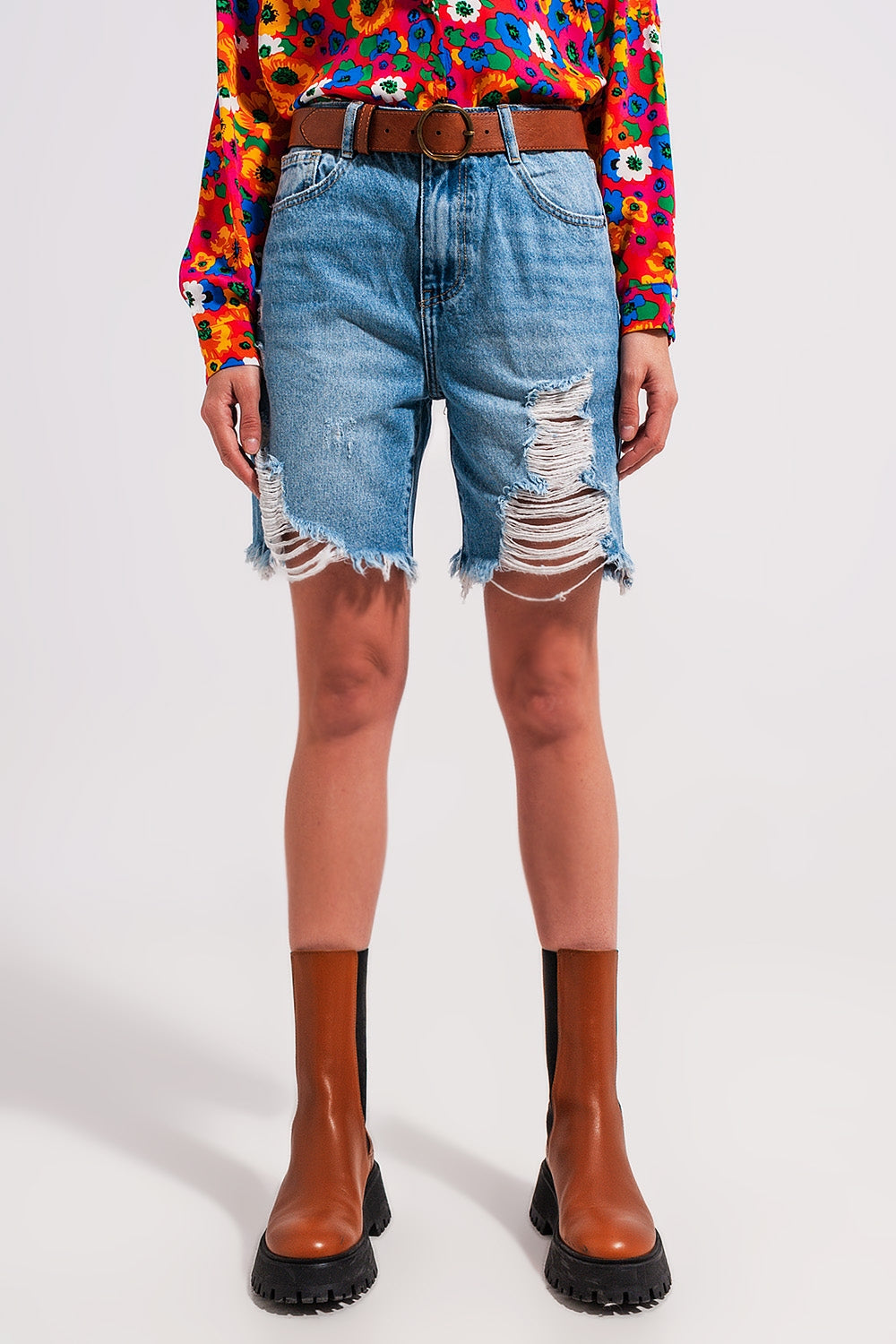 Denim shorts with distressing in light blue