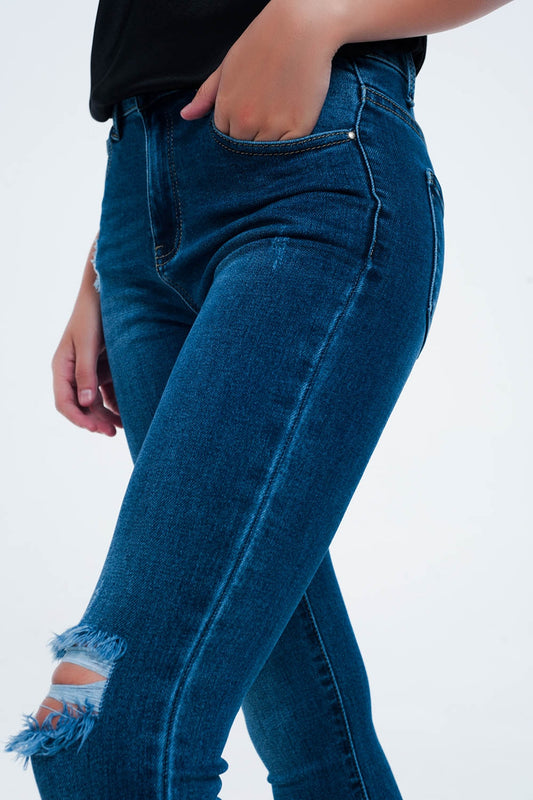 Distressed skinny fit jeans in mid wash Szua Store