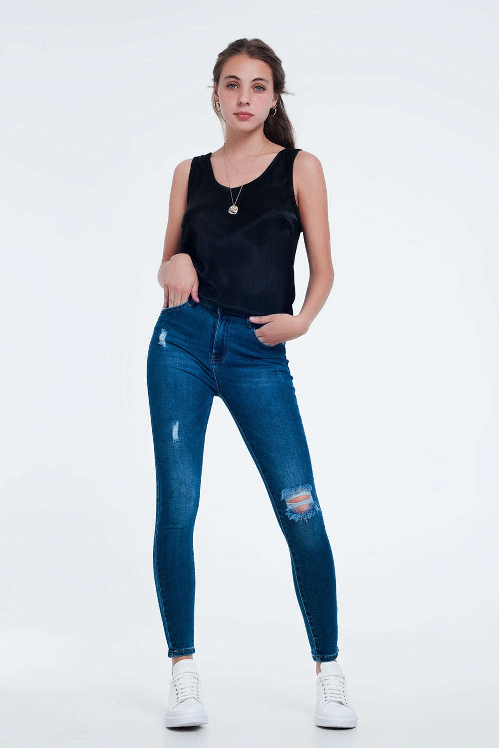 Distressed skinny fit jeans in mid wash Szua Store