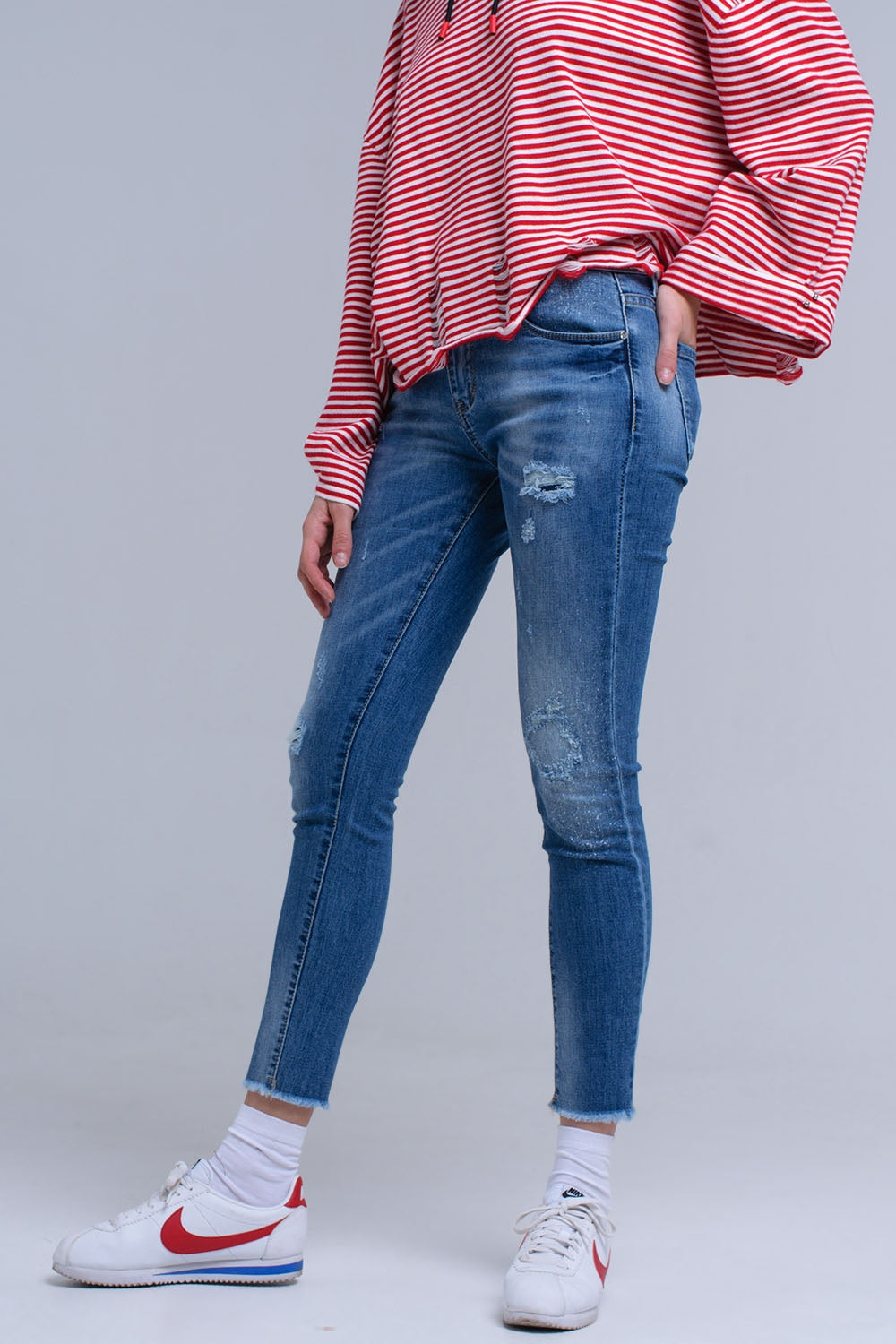Distressed skinny jeans with fringes Szua Store