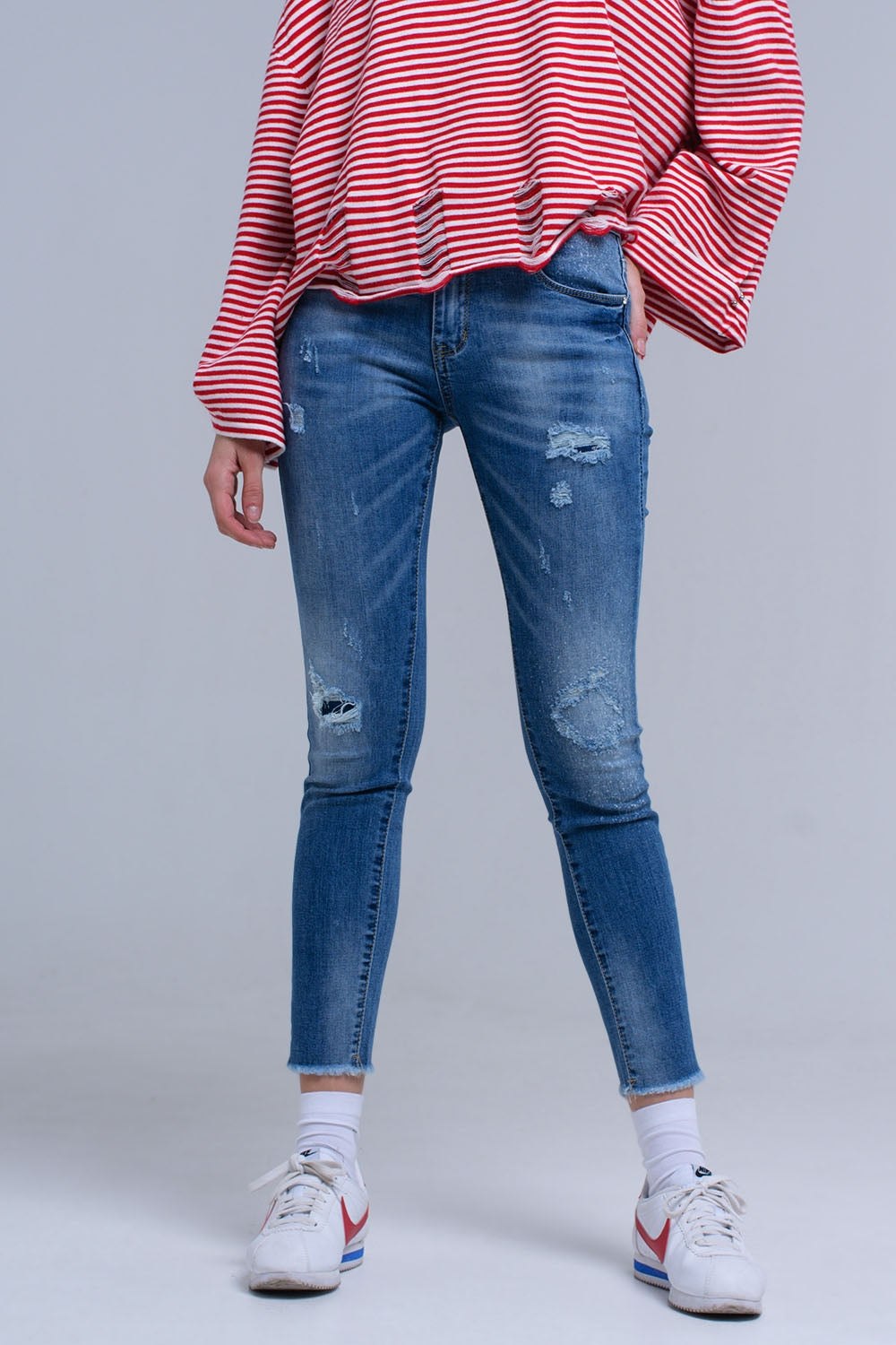 Distressed skinny jeans with fringes Szua Store