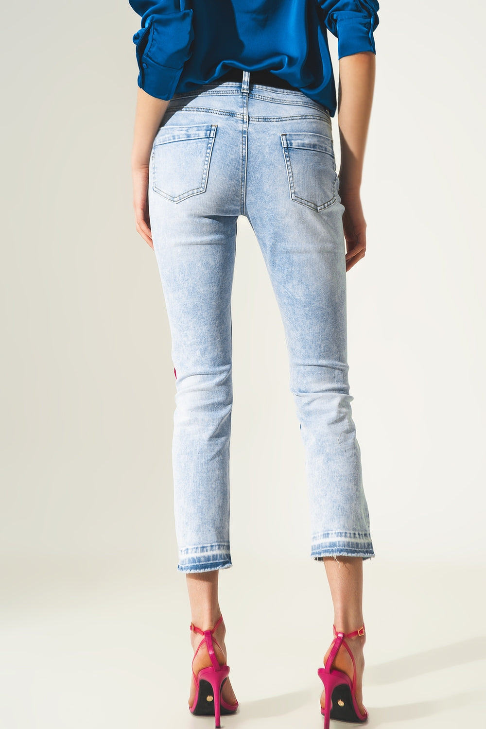Distressed straight jeans with hem detail in blue - Szua Store