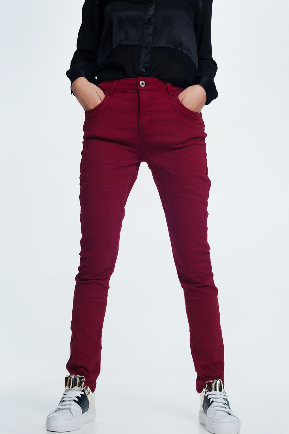 Drop crotch skinny jean in maroon