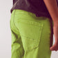 Exposed buttons skinny jeans in green Szua Store