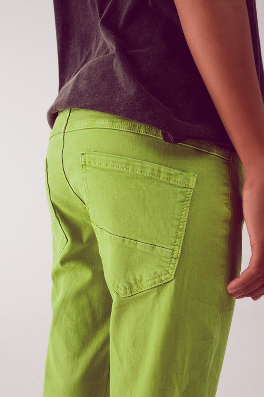 Exposed buttons skinny jeans in green Szua Store