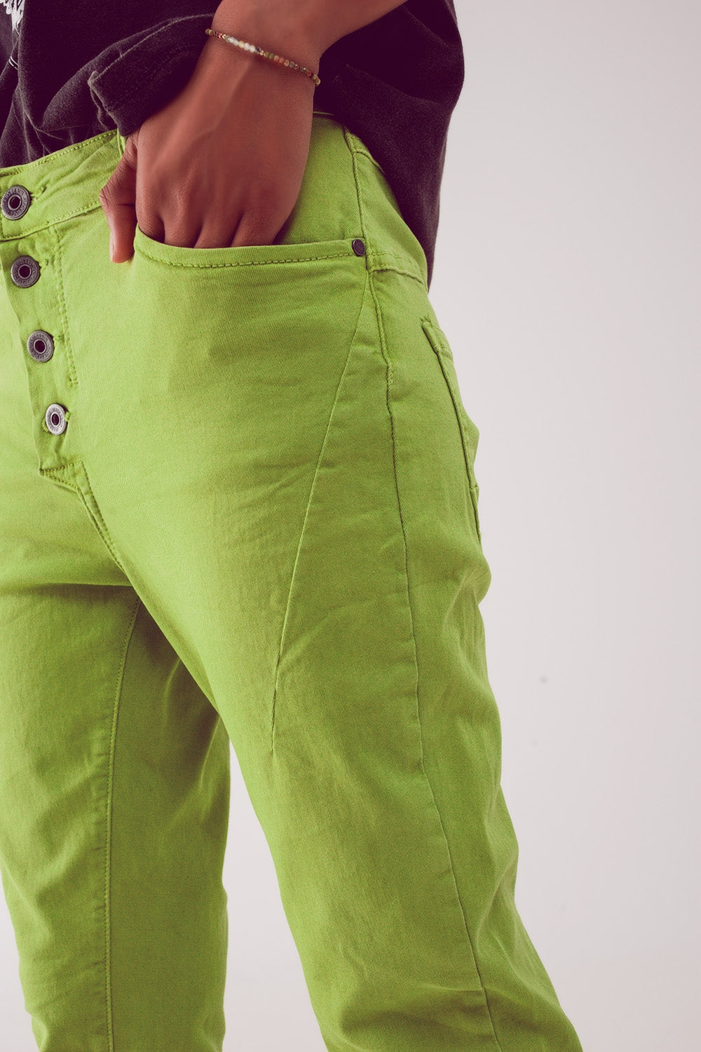 Exposed buttons skinny jeans in green Szua Store