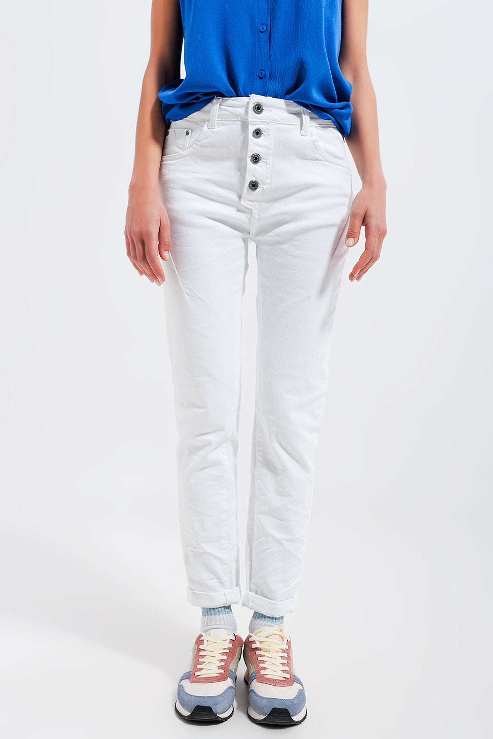 Exposed buttons skinny jeans in white Szua Store
