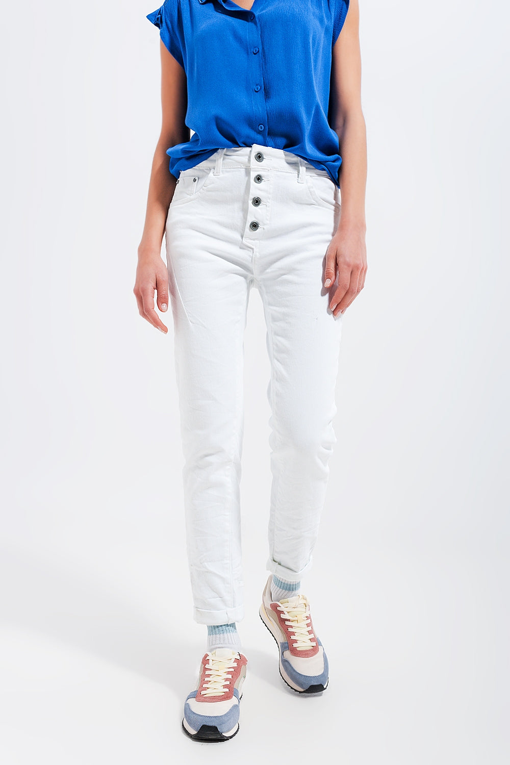 Exposed buttons skinny jeans in white Szua Store