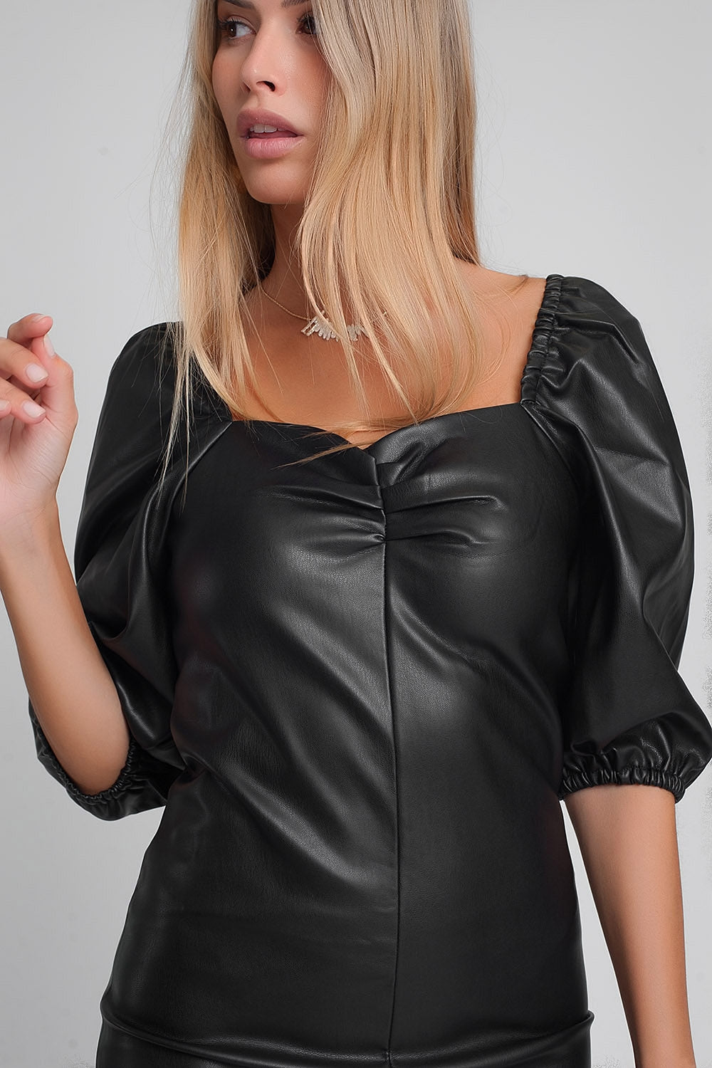 Faux leather mini dress with puff sleeves in black Szua Store