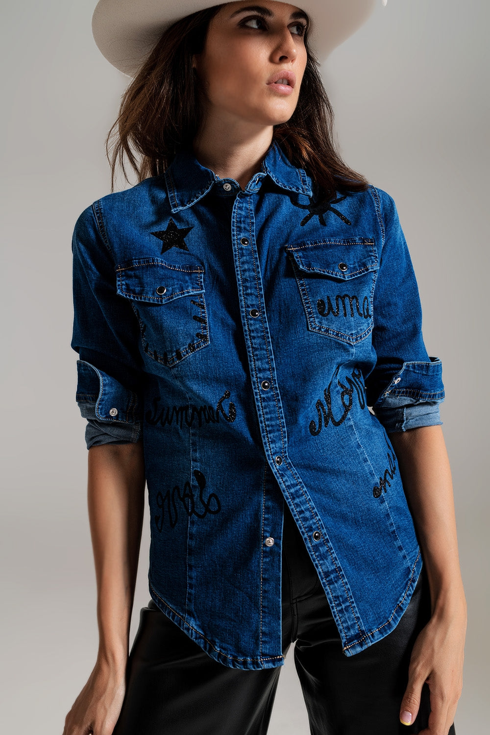 Fitted denim shirt with black graphic details with strass