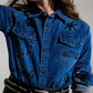 Fitted denim shirt with black graphic details with strass