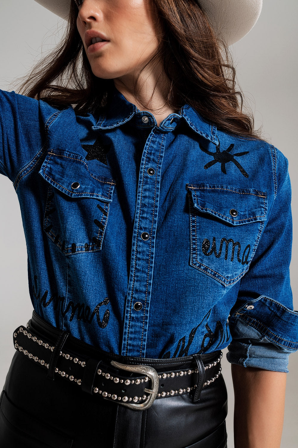 Fitted denim shirt with black graphic details with strass