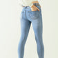 Five-pocket skinny jeans in stretch denim with strass detail all over
