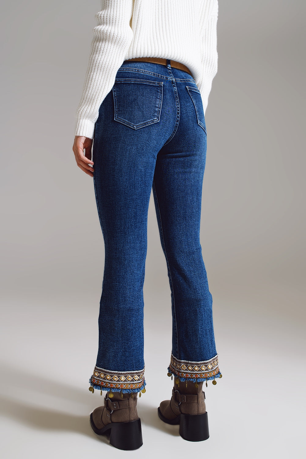 Flare jeans with embellished hem