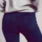Flare jeans with raw hem edge in blue ink Szua Store