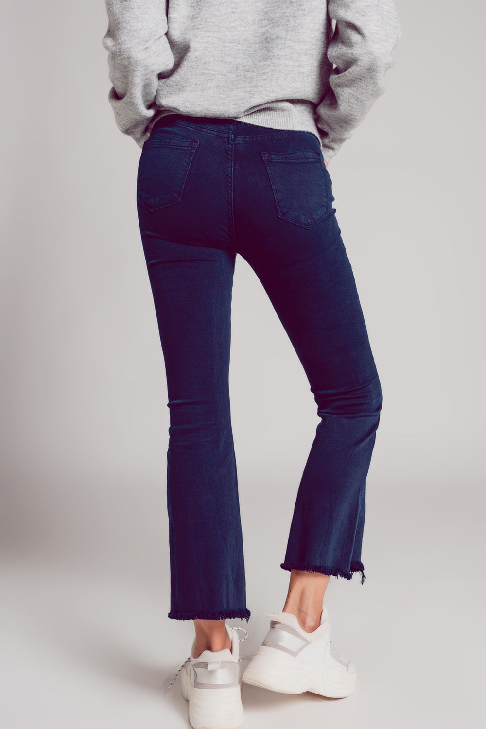 Flare jeans with raw hem edge in blue ink Szua Store