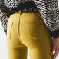 Flare jeans with raw hem edge in green Szua Store