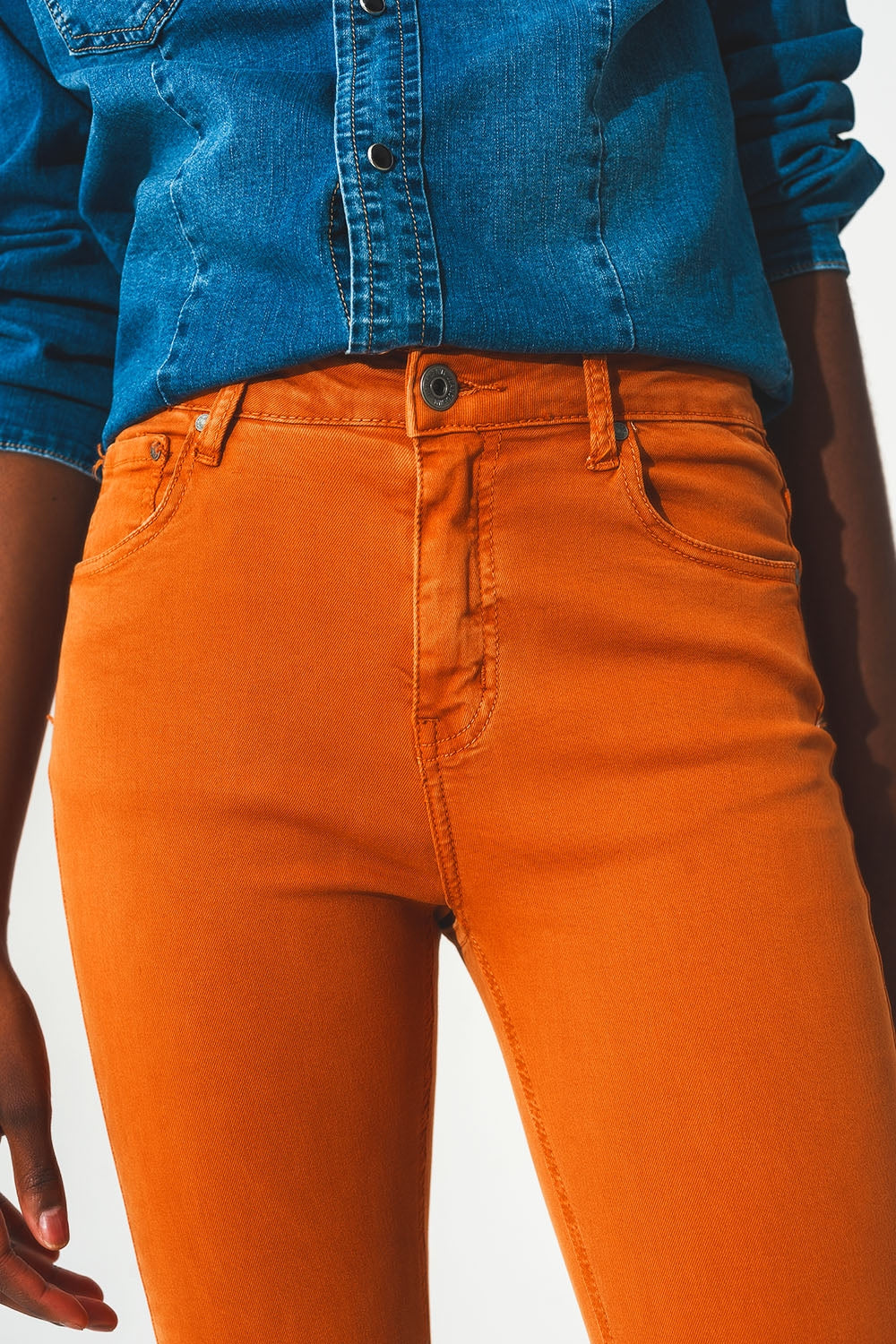 Flare jeans with raw hem edge in orange - Szua Store