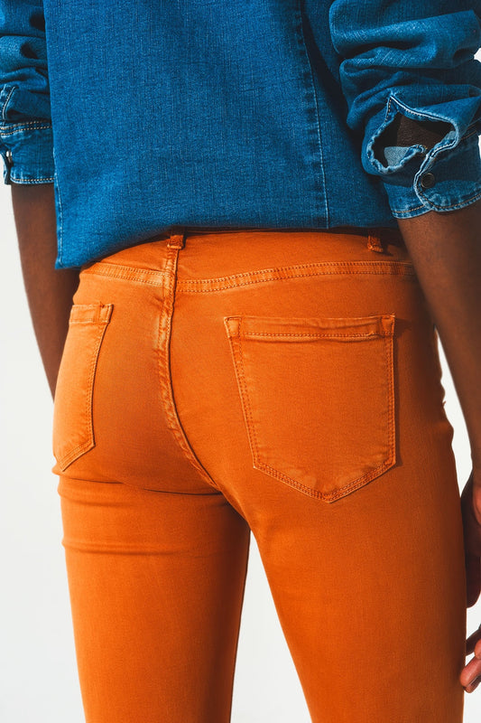 Flare jeans with raw hem edge in orange - Szua Store