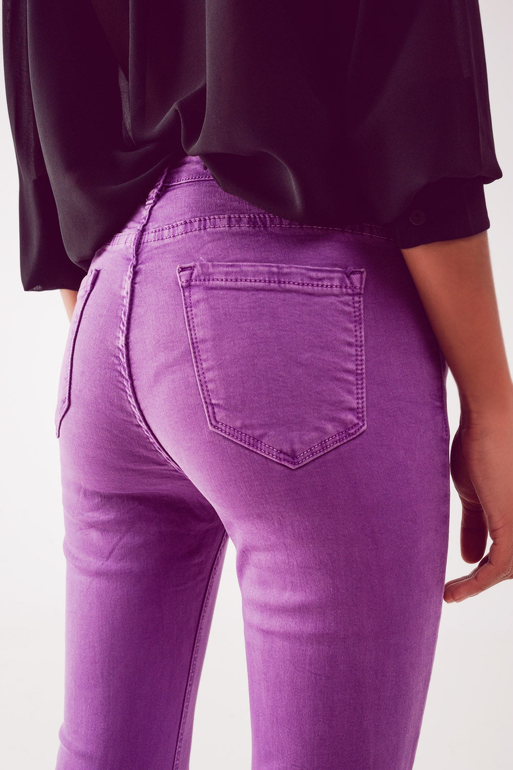 Flare jeans with raw hem edge in purple Szua Store