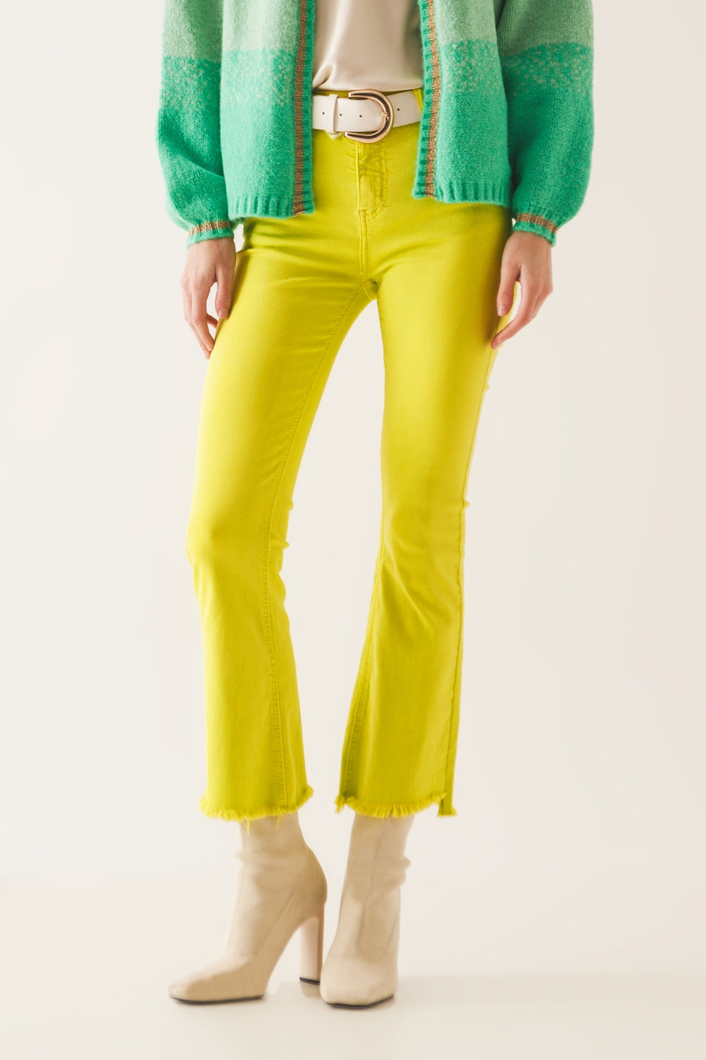 Flare jeans with raw hem edge in yellow - Szua Store