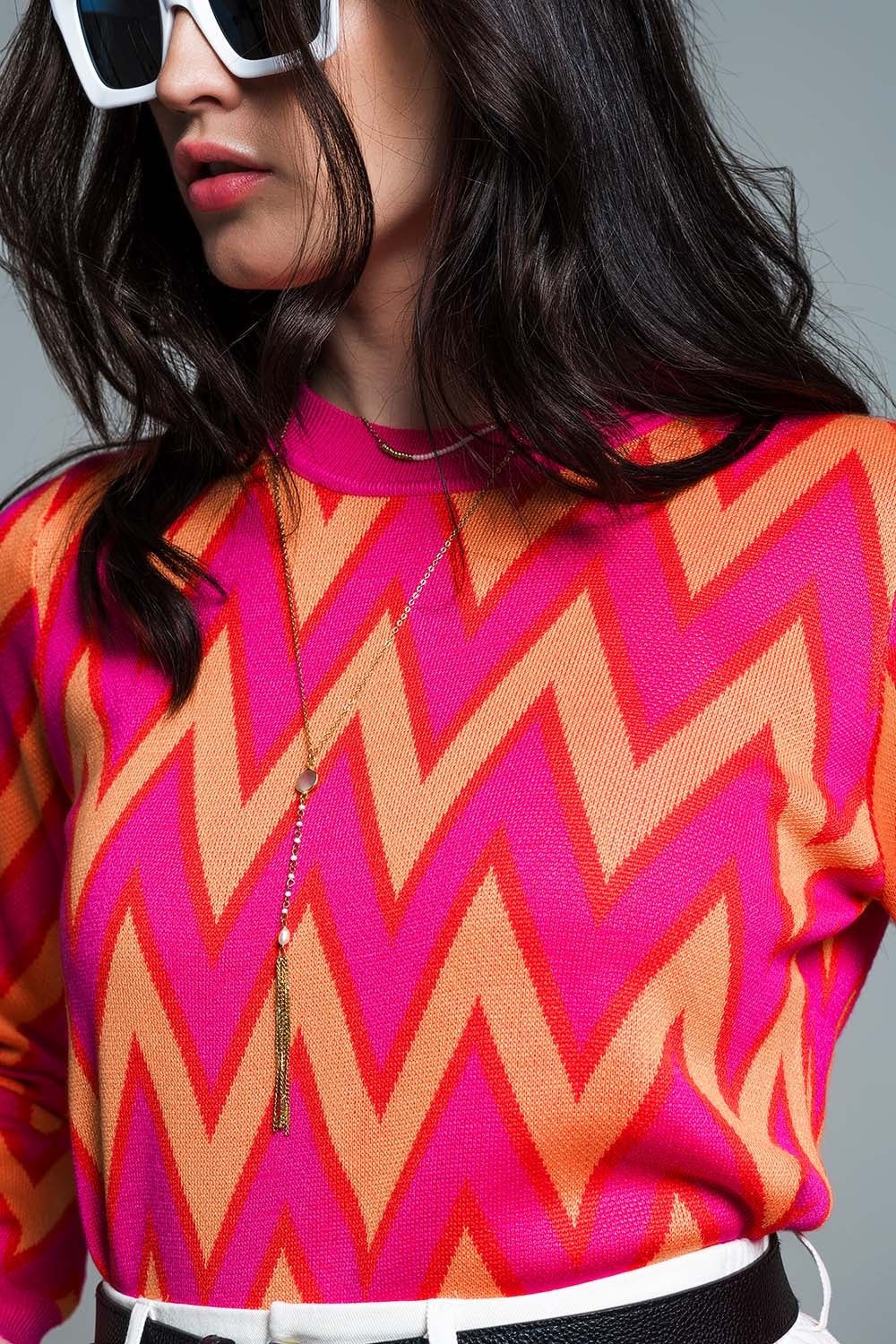 Jersey fucsia con estampado en zig zag con detalles en naranja