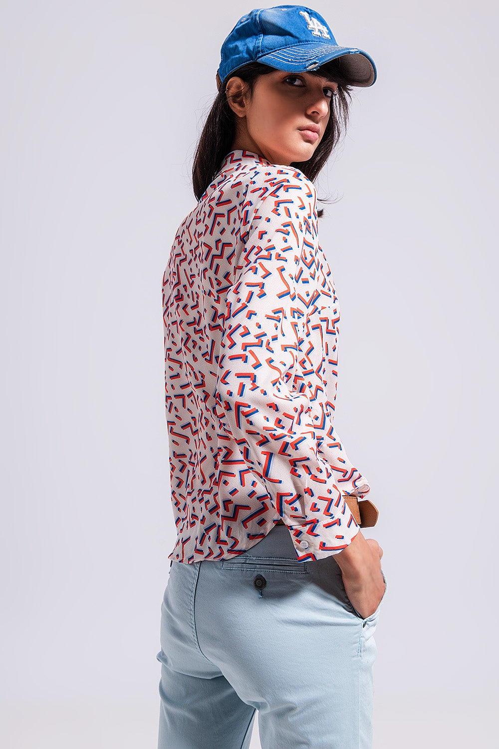 Geo print front buttoned shirt in orange Szua Store