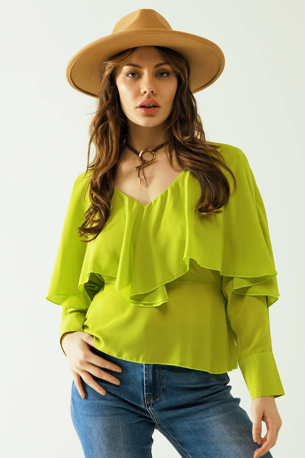 Q2 Green long sleeve top with a ruffle detail and bare back