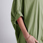 Green oversized blouse with short sleeve