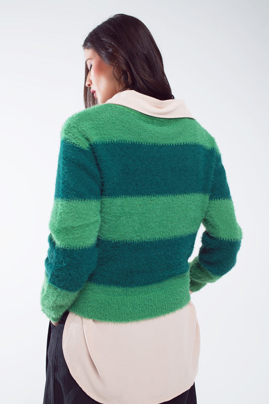 Green sweater with stripes and a crew neck
