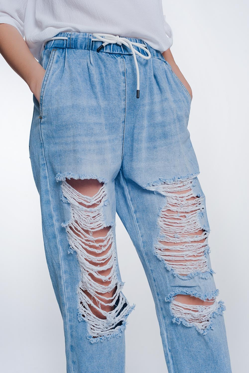 Heavily ripped boyfriend jeans in light denim Szua Store