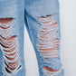 Heavily ripped boyfriend jeans in light denim Szua Store
