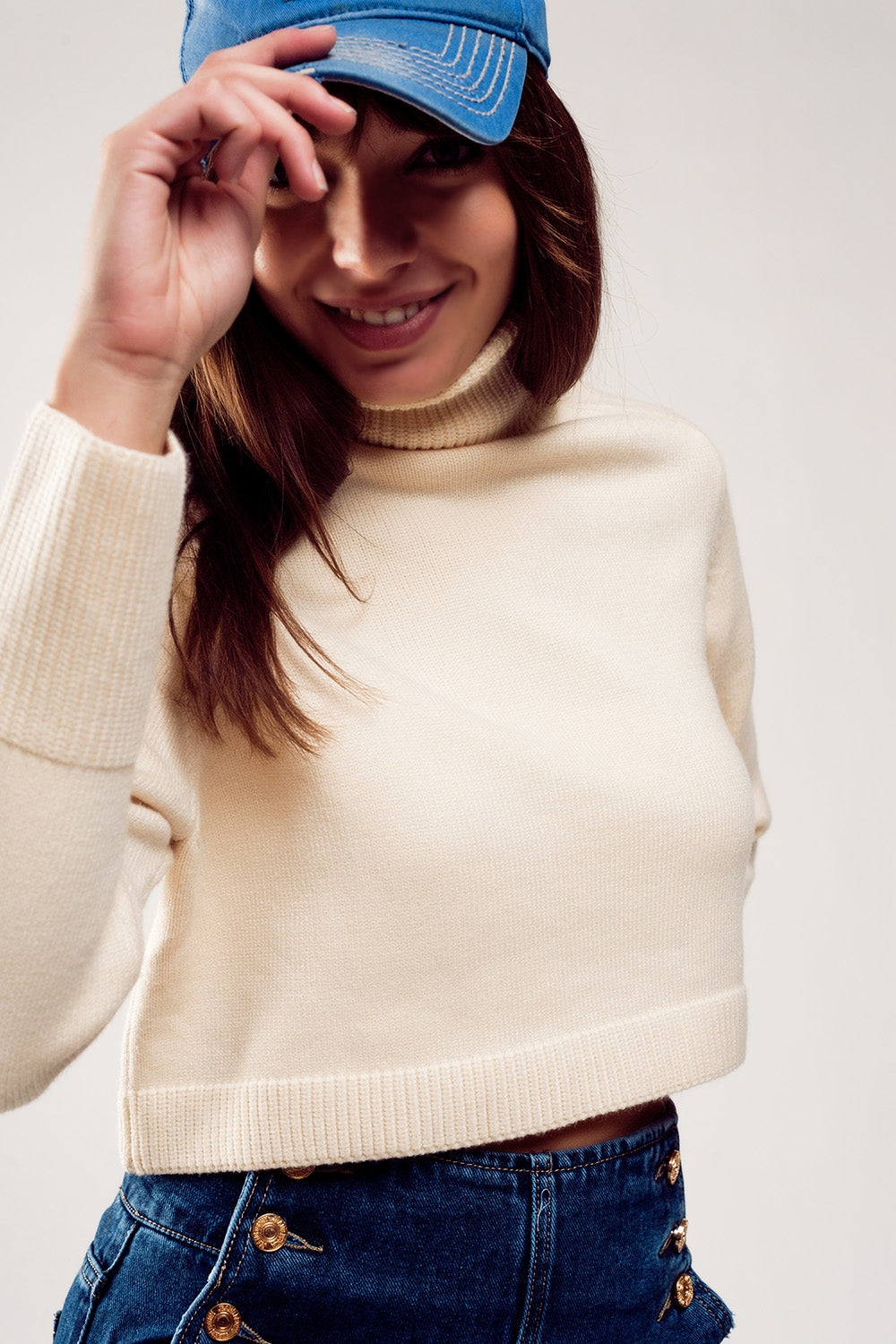 High neck cropped jumper in cream Szua Store