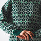 High neck jumper in geo pattern in green Szua Store